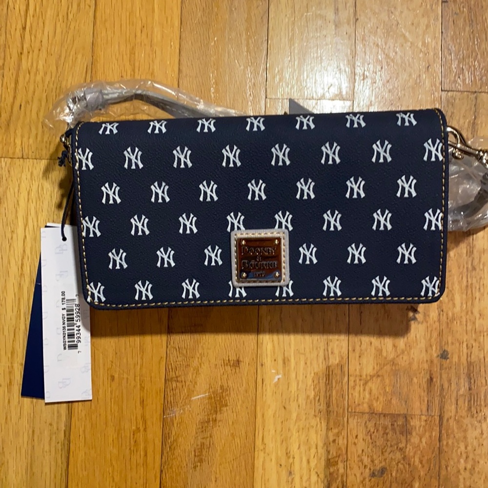 COPY - Dooney and Bourke clutch. Brand new yankee…
